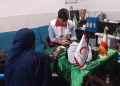 ارائه خدمات رایگان داوطلبانه در محل نخل پیرمرد بندرعباس توسط هلالاحمر