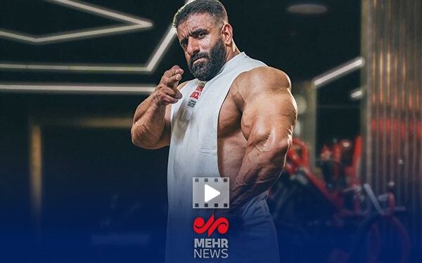 تصویر رهبرانقلاب بک‌گراند گوشی قهرمان مسترالمپیا